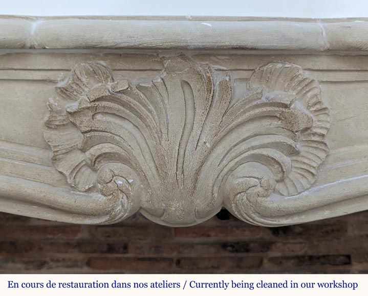 Louis XV style mantel adorned with a carved stone palmette-1