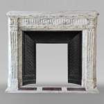 Louis XVI style mantel with curved flutes and carved capitals in highly veined Arabescato marble