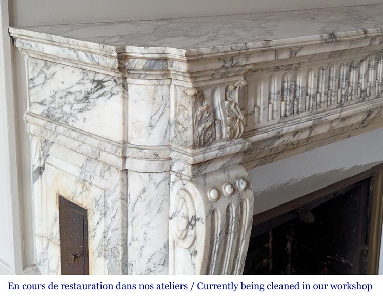 Louis XVI style mantel with curved flutes and carved capitals in highly veined Arabescato marble-3