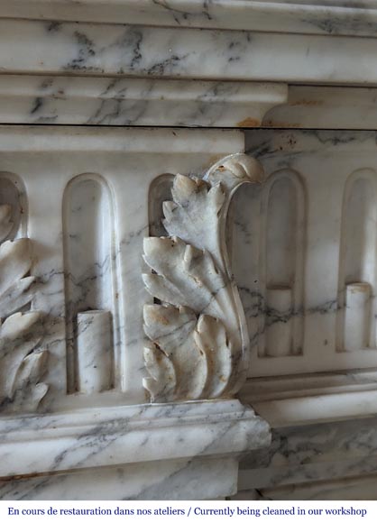 Louis XVI style mantel with curved flutes and carved capitals in highly veined Arabescato marble-4