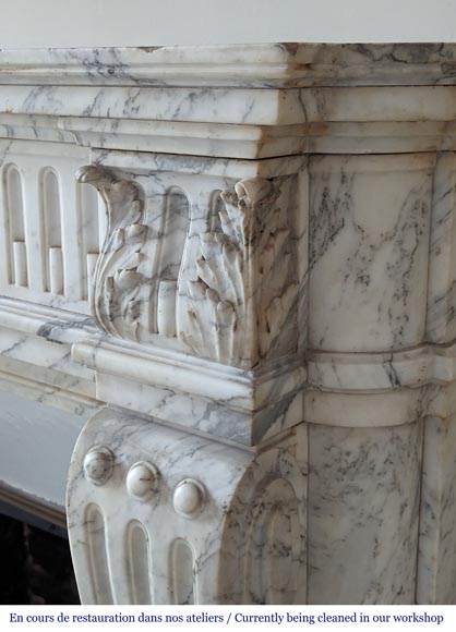 Louis XVI style mantel with curved flutes and carved capitals in highly veined Arabescato marble-8