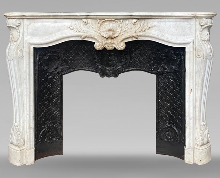 Louis XV style mantel with shell framed by palmettes carved in Carrara marble-0