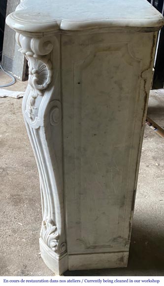 Louis XV style mantel with shell framed by palmettes carved in Carrara marble-4