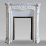 Louis XV style Pompadour model mantelpiece in Carrara marble, decorated with shells