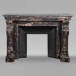 Restoration mantelpiece in Portor marble adorned with volutes