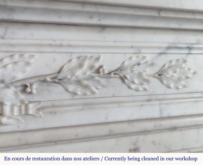 Round Louis XVI style mantel in Carrara marble adorned with a laurel wreath-3