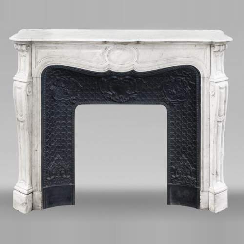 Louis XV style Pompadour model fireplace, in Carrara marble