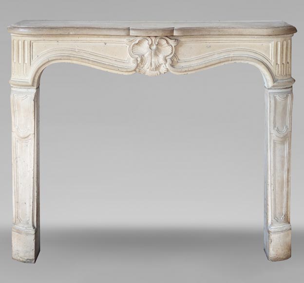 Louis XV period carved stone mantel with shell, 18th century - Stone