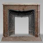 Louis XV style Pompadour mantel in Enjugerais Breche