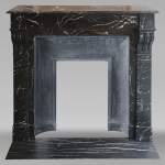 Napoleon III style mantel with modillions carved in black Marquina marble