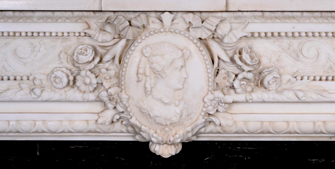 Louis XVI style white marble fireplace with rounded columns and female profile medallion-1