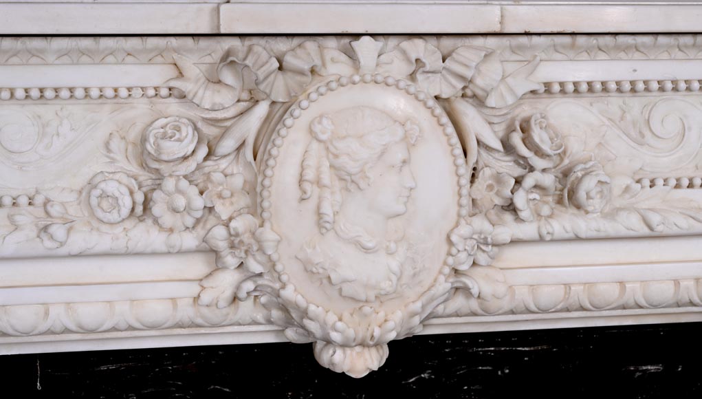 Louis XVI style white marble fireplace with rounded columns and female profile medallion-2