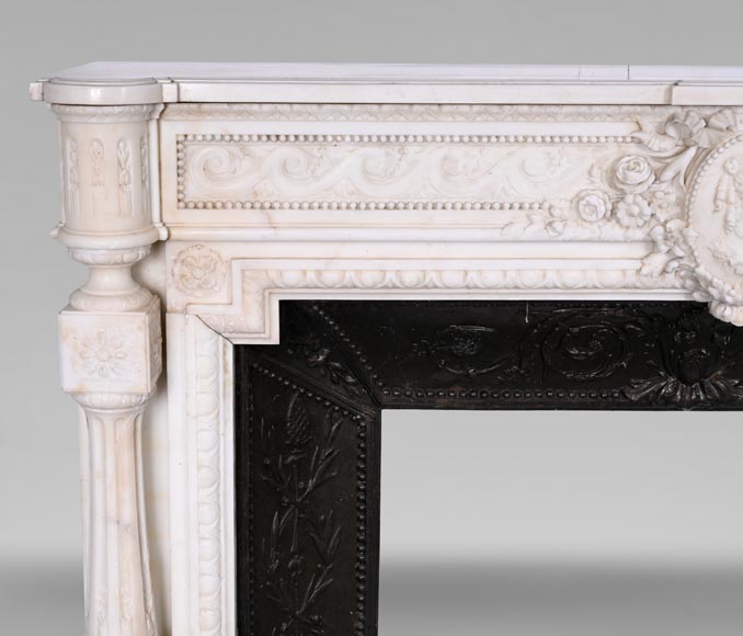 Louis XVI style white marble fireplace with rounded columns and female profile medallion-5