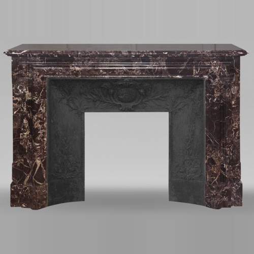 Louis XIV style fireplace with boudin in Levanto marble