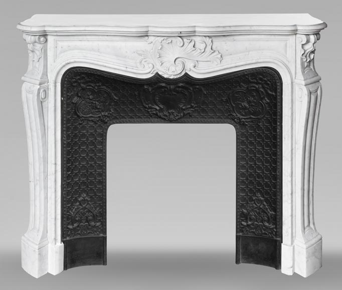 Louis XV style fireplace with an asymmetrical shell, in Carrara marble-0