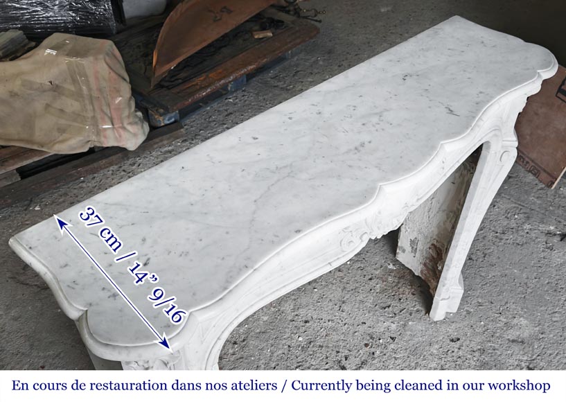 Louis XV style fireplace with an asymmetrical shell, in Carrara marble-10