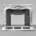  Large Louis XV style fireplace decorated with a large shell, in Saravenza marble