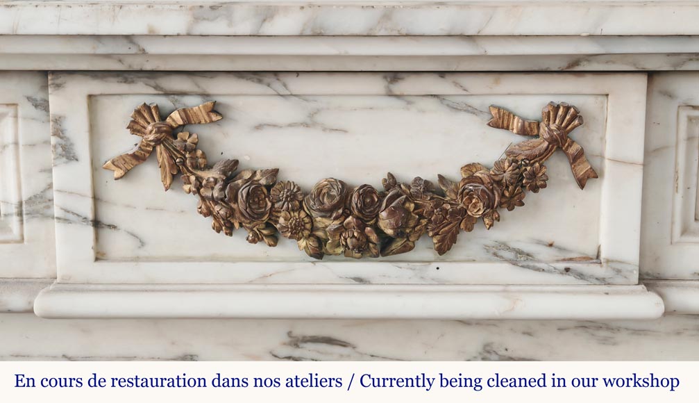 Louis XVI style fireplace in Arabescato marble decorated with a garland of gilded bronze flowers-1