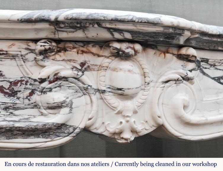 Louis XV style fireplace in Violet Breccia, with a central cartouche framed by palmettes-2