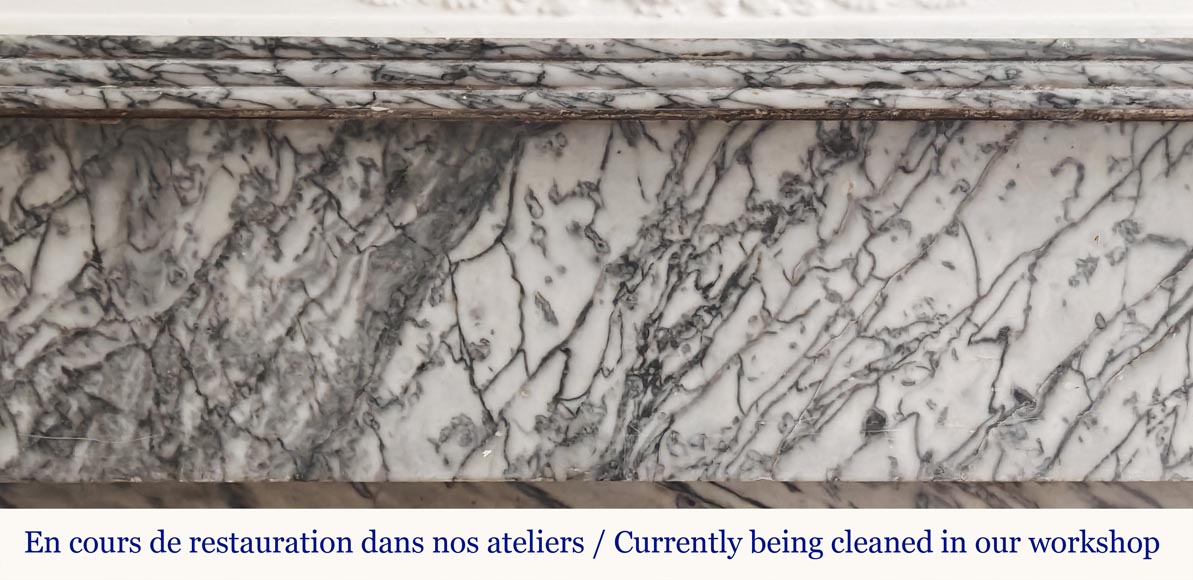 Small modillion-type fireplace in blue flowered marble-1