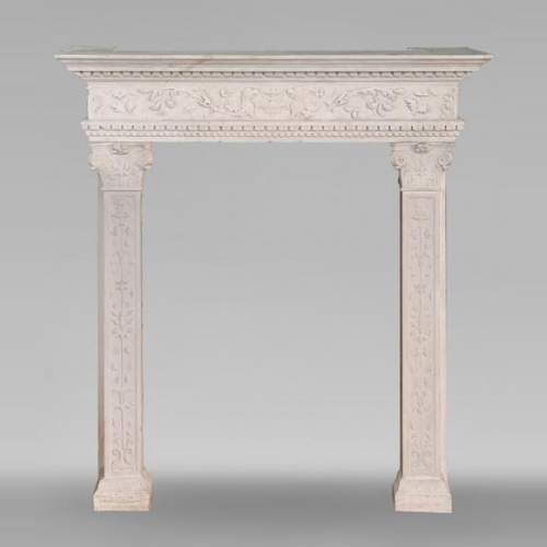 Neo-Renaissance style stone fireplace with vegetal ornamentation