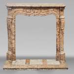 Louis XV style fireplace, Pompadour model, in brocatelle-type marble