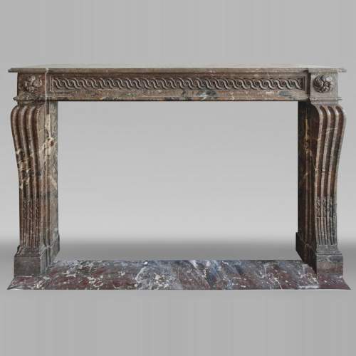 Louis XVI period fireplace, curved red, decorated with a Greek frieze