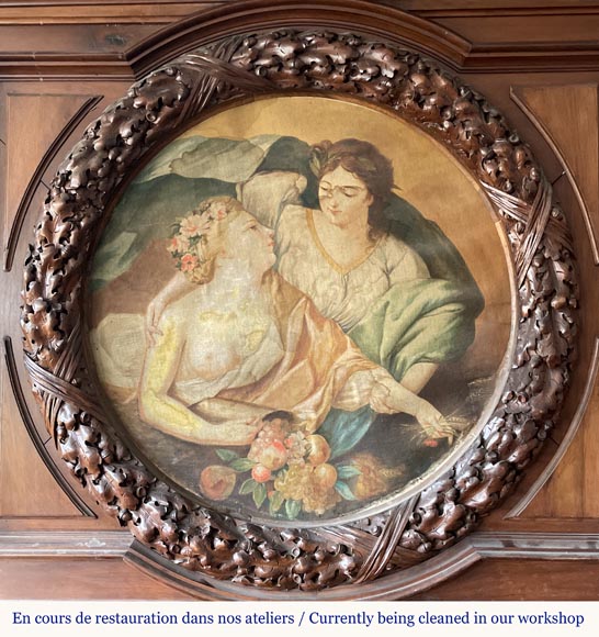 Monumental carved walnut fireplace with atlantes and painted