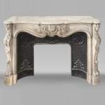 Louis XV style fireplace, highly sculpted in Carrara marble, decorated with flowers