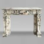 Louis XVI style fireplace in Paonazzo marble, decorated with a pearl frieze