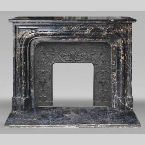 Louis XIV style fireplace with Portor marble boudin