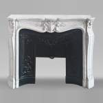 Louis XV style fireplace in Carrara marble decorated with a palmette