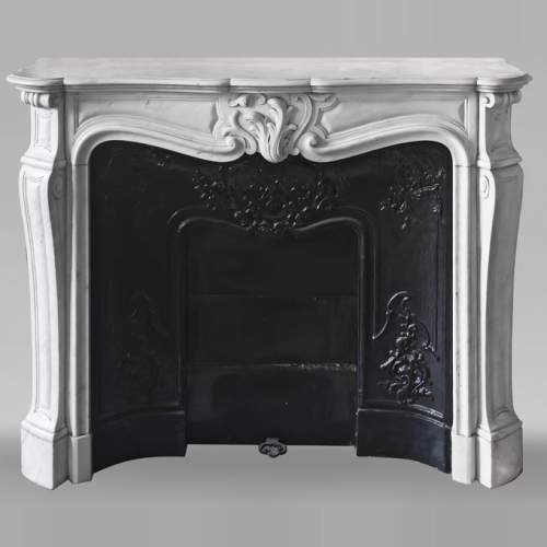 Louis XV style fireplace in Carrara marble with an asymmetrical shell