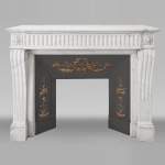 Louis XVI style fireplace in half-statuary marble, with rudenté decoration
