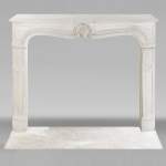 Louis XV style stone fireplace, decorated with a shell
