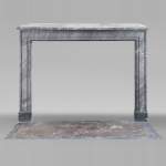 Louis XVI period fireplace in blue turquin marble, with molding decoration
