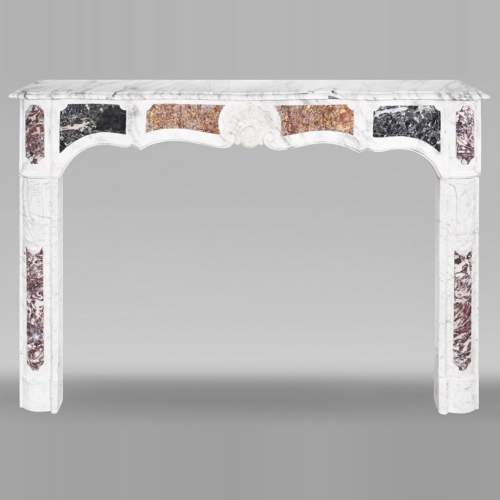 Provençal-style fireplace in veined Carrara marble and colored marble