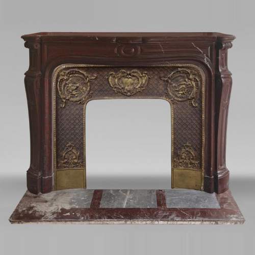 Louis XV style Pompadour model curved fireplace, in griotte marble