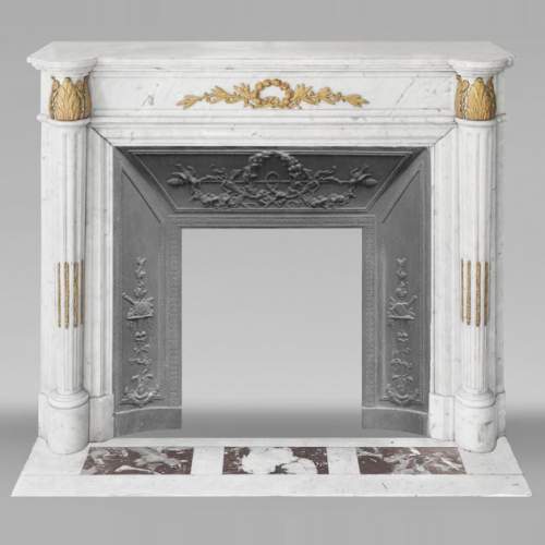 Louis XVI style fireplace with half-columns and bronze decorations, in Carrara marble