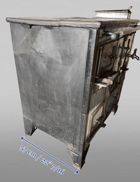 Cast-iron stove with faience imitation and snowy landscape decoration-5