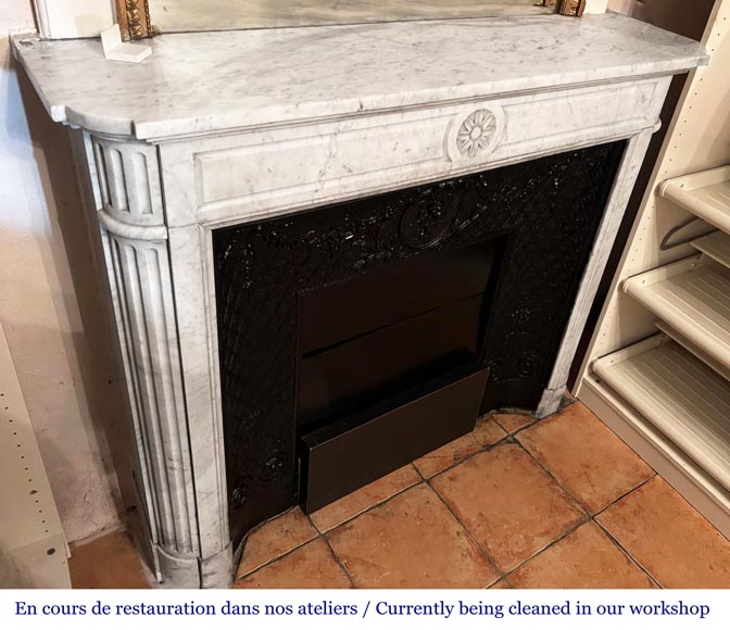 Louis XVI style fireplace with rounded corners, decorated with a daisy, in Carrara marble-2