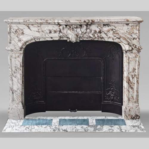 Important Regency style fireplace in purple breccia marble