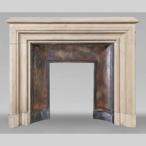 Louis XIV style stone fireplace from the 1950s