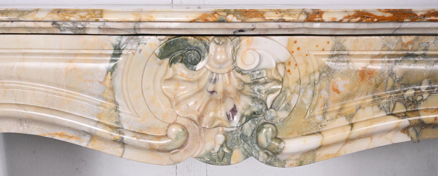 Louis XV style fireplace with three shells in Médou breccia Louis XV style fireplace with three shells in Médou breccia-1