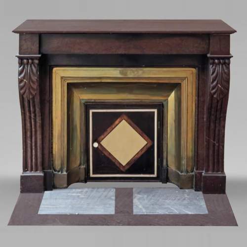 Napoleon III style fireplace in griotte marble with a brass interior