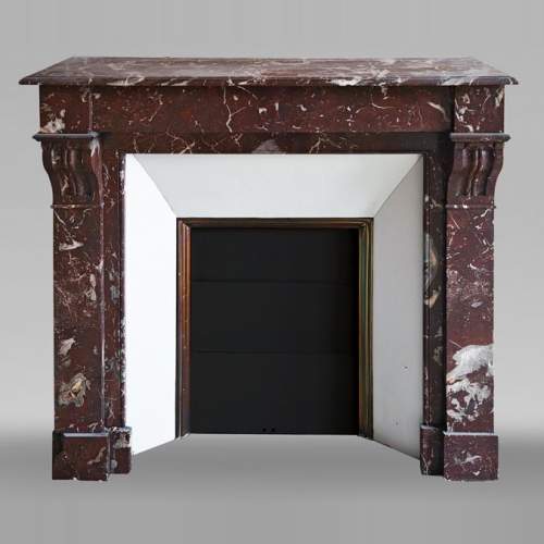 Napoleon III style fireplace, modillion type, in northern red marble