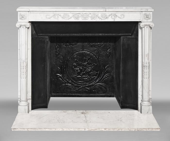 Louis XVI style fireplace in semi-statuary marble, featuring columns and Ionic capitals Louis XVI style fireplace in semi-statuary marble, featuring columns and Ionic capitals-0