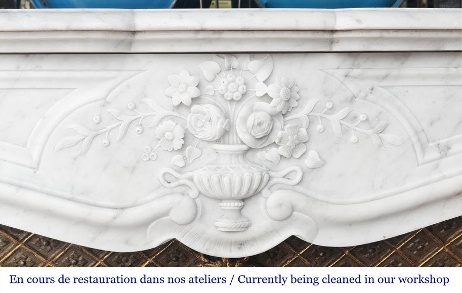 Louis XV style fireplace in Carrara marble, decorated with a vase of flowers-1