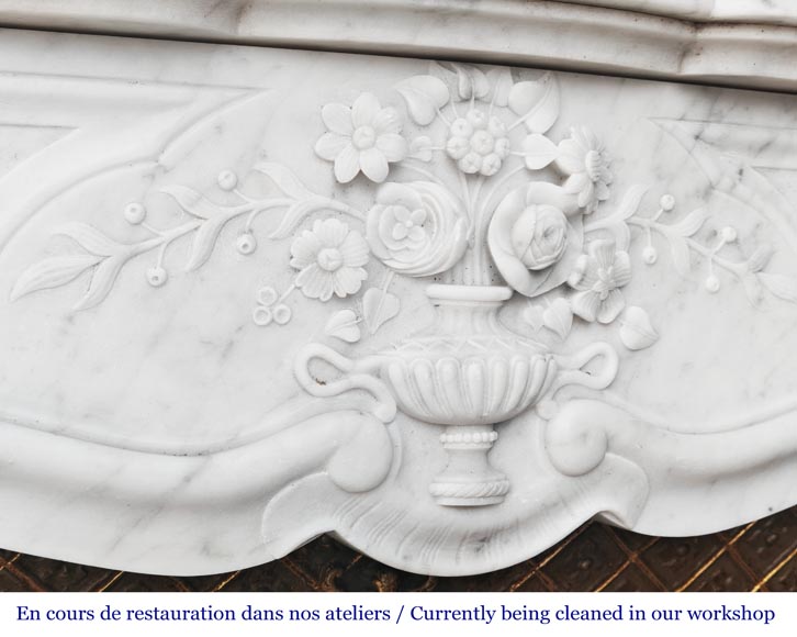 Louis XV style fireplace in Carrara marble, decorated with a vase of flowers-2