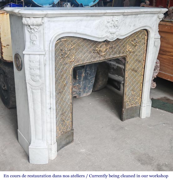 Louis XV style fireplace in Carrara marble, decorated with a vase of flowers-5